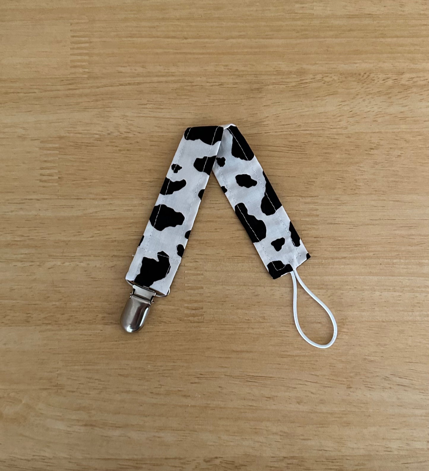 Black Cow Print Pacifier Clip